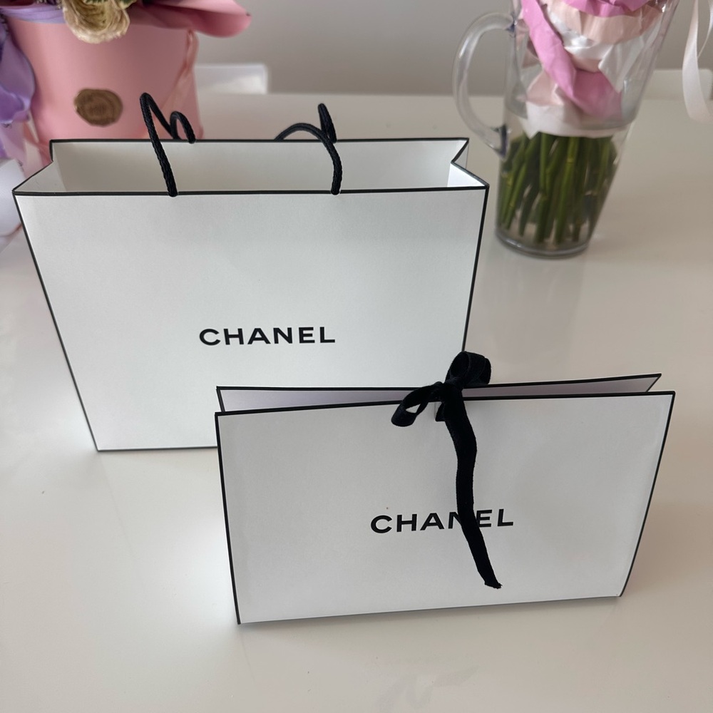 CHANEL White Shopping Bags with Black Accents